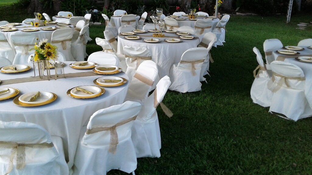 tables set up for wedding reception outside at The Cottage on Lake Fairview